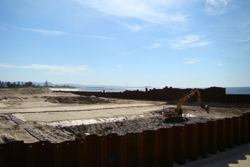 Construction gets underway at the entrance of the Shell Cove Boat Harbour