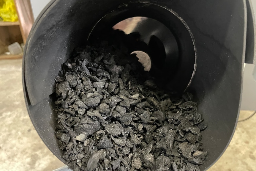 Photo of charcoal in a pipe.