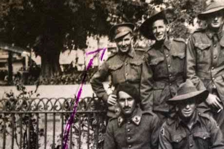 Black and white pic of a group of soldiers in World War II.