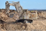 A mining excavator at work at Daunia mine.