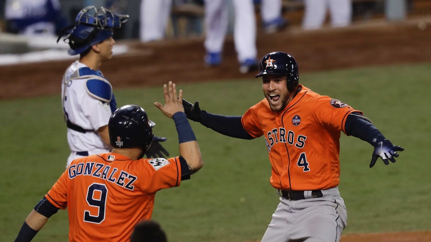 Houston Astros' George Springer (4) reacts to his home run against LA in World Series game seven.