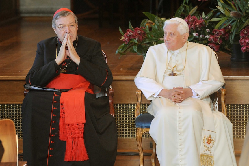 Pope Benedict sits alongside George Pell during World Youth Day celebrations in 2008.