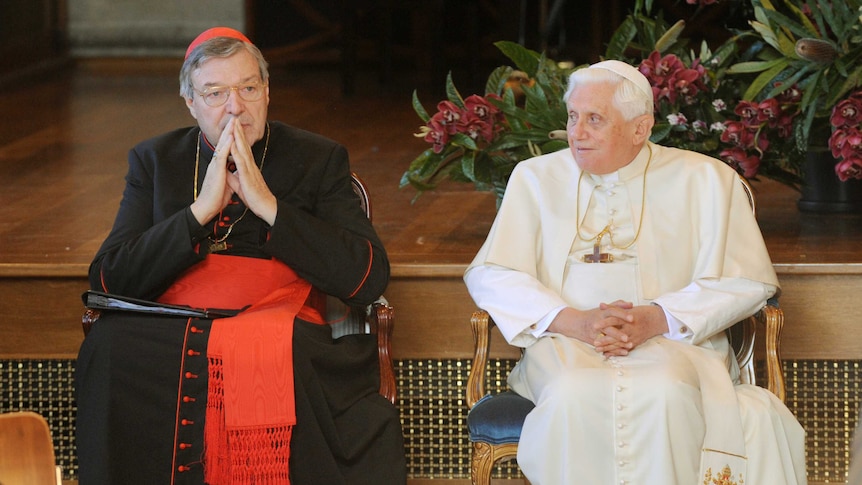 Pope Benedict sits alongside George Pell during World Youth Day celebrations in 2008.