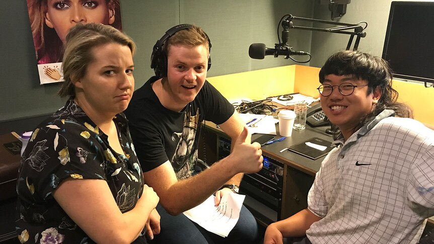 Bridie Connell and Aaron Chen with Tom Ballard