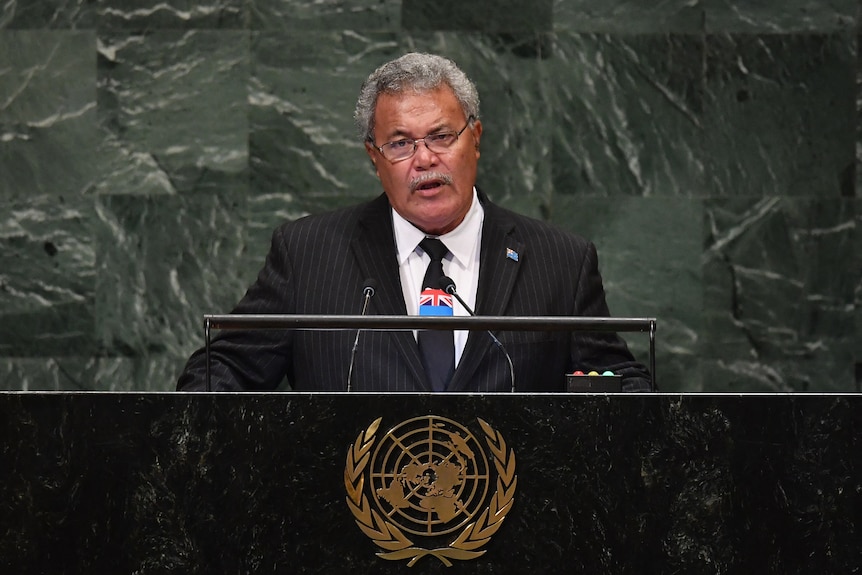Tuvalu prime minister Enele Sopoaga addresses the UN General Assembly standing at a lectern.