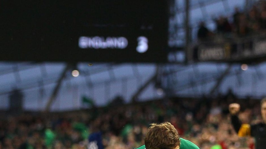 Ireland centre Brian O'Driscoll breaks the championship try-scoring record.