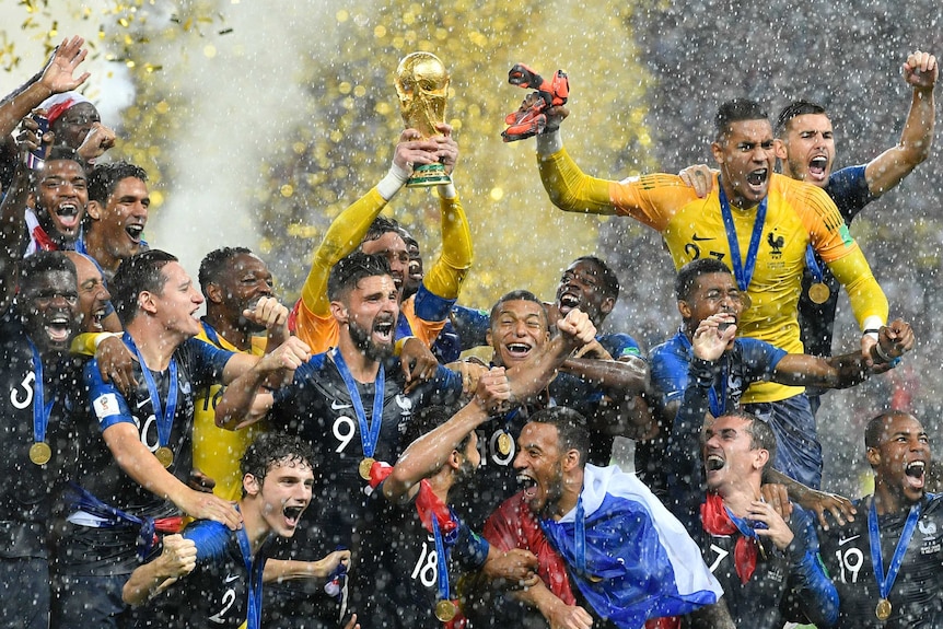 France celebrates with World Cup trophy