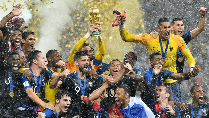 France celebrates with World Cup trophy