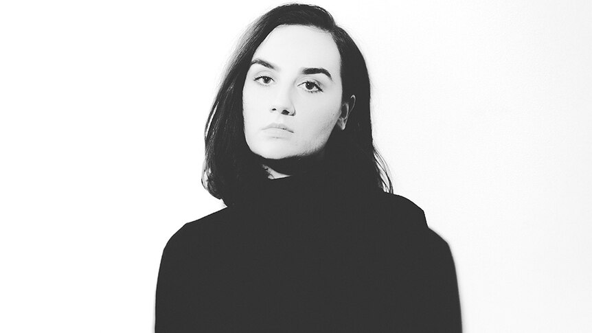 A 2018 black and white press shot of Meg Mac