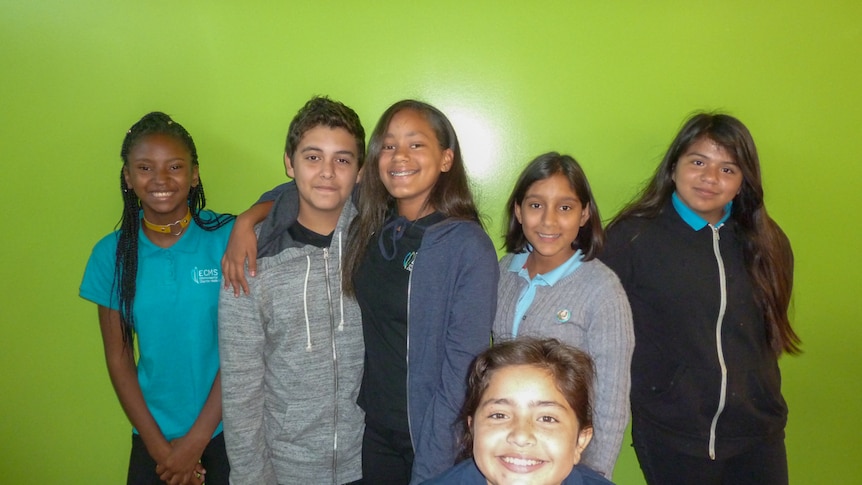 Children standing in a group afterschool.