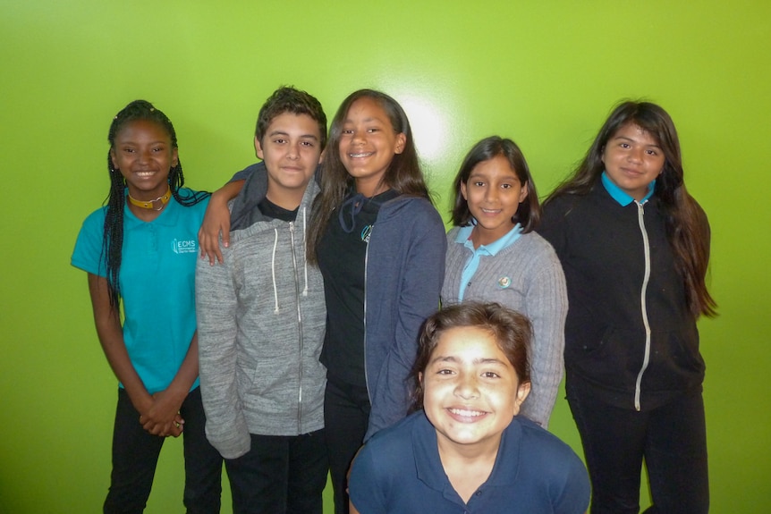 Children standing in a group afterschool.