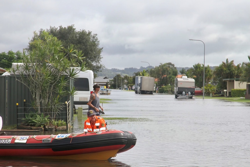 SES boat in flood waters