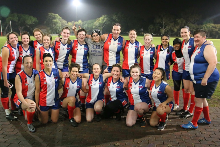 Players standing together for a group photo at the Adelaide Lutheran Sports Club