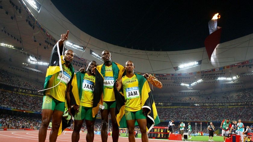 Asafa Powell, Nesta Carter, Usain Bolt and Michael Frater after winning gold