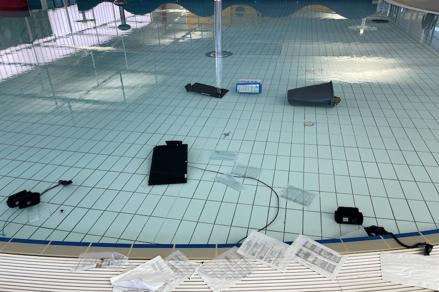 Computers in a public swimming pool.