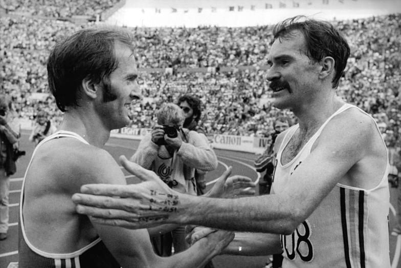 Rob De Castella with East Germany's double Olympic champion Waldemar Cierpinski in 1983.