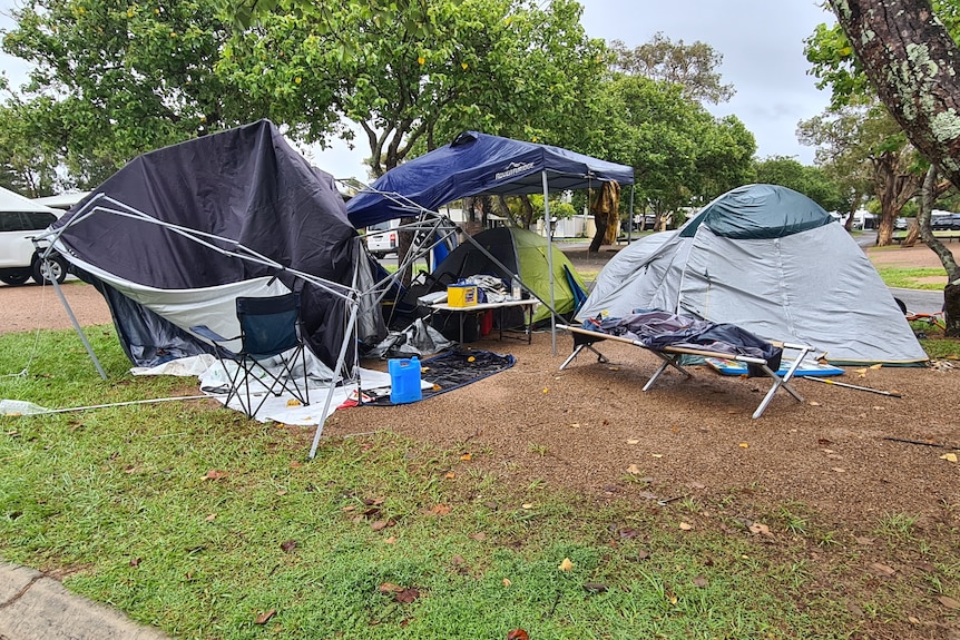 Two destroyed gazebos and abandoned tents.