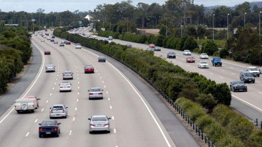 Cars driving on the Pacific Motorway between the Gold Coast and Brisbane
