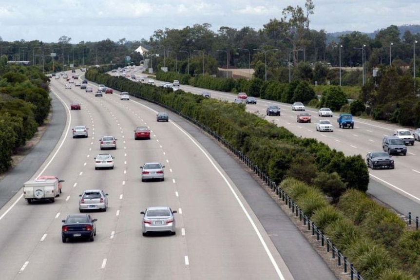 Cars driving on the Pacific Motorway between the Gold Coast and Brisbane