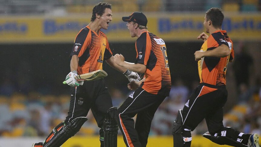 Nathan Coulter-Nile (L) and Michael Beer celebrate the win by the Perth Scorchers.