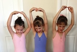 Lucy Daniels and her friends Molly and Emily Harrison practice their ballet moves.