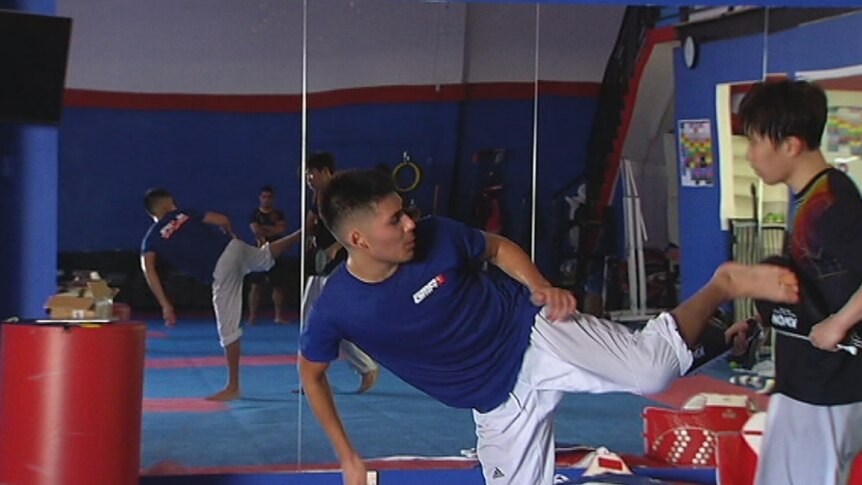 Hayder Shkara kicks during a training session.