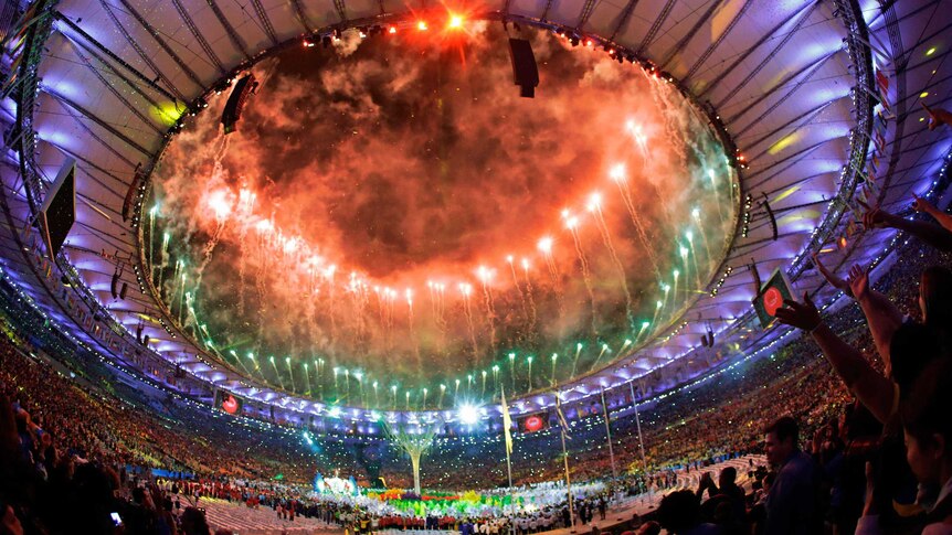 Fireworks erupt during the Olympics closing ceremony in the Maracana stadium.