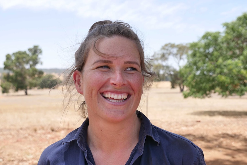 Portrait photo of Jemma Brown in field.