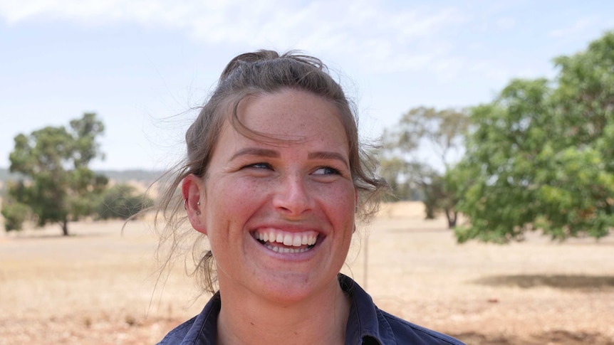 Portrait photo of Jemma Brown in field.