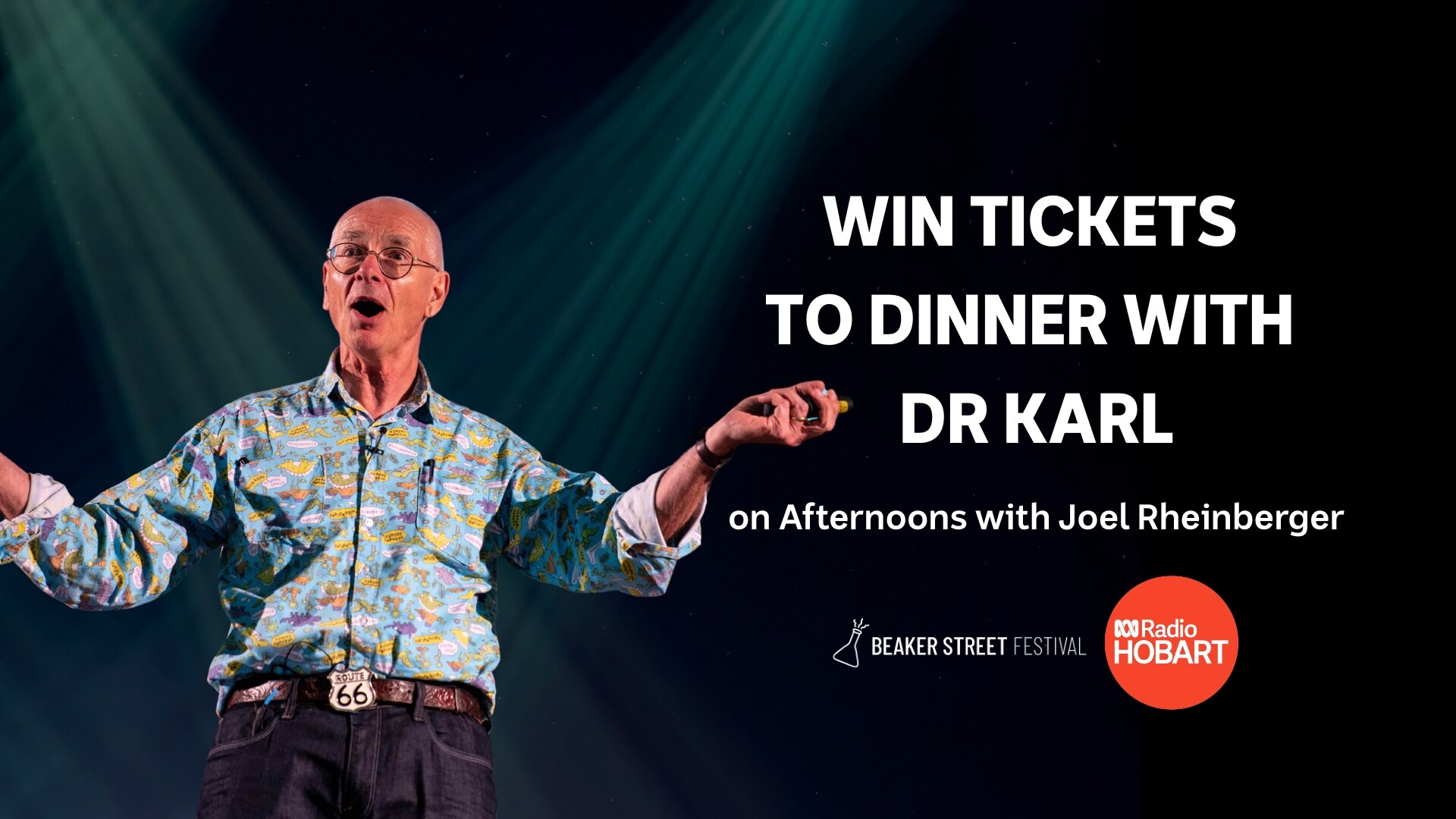 photo of Dr Karl with black background and blue stage lights