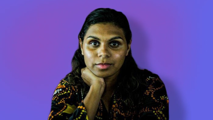 A portrait of Molly Hunt, wearing a brightly printed shirt, illustrating her guide to finding love in the Kimberley region of WA