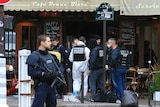 Police investigators after Paris attacks