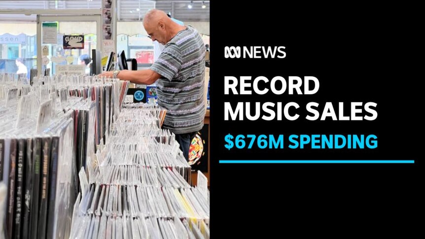 Record Music Sales, $676m Spending: Man flicks through tows of vinyl records at a music store.