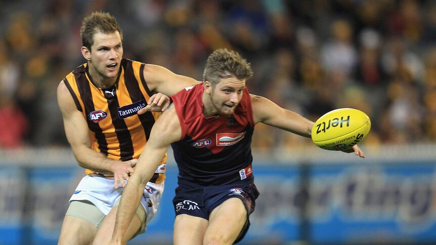 Hawthorn's Stephen Gilham (L) has been traded to the Western Sydney Giants.