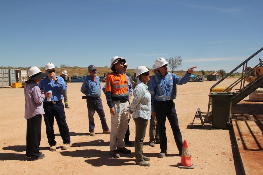 several members of the NT fracking inquiry panel and inquiry chair Justice Rachel Pepper tour the Santos Moomba gas field