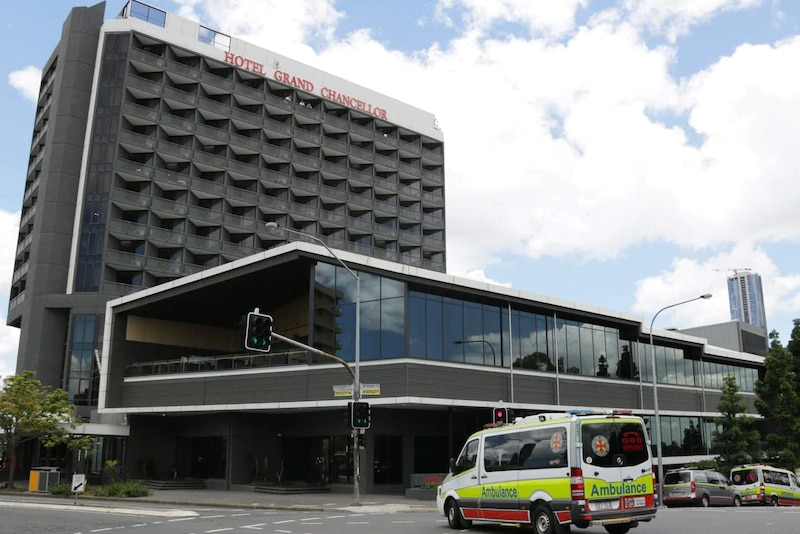 picture of hotel grand chancellor with an ambulance in the foreground