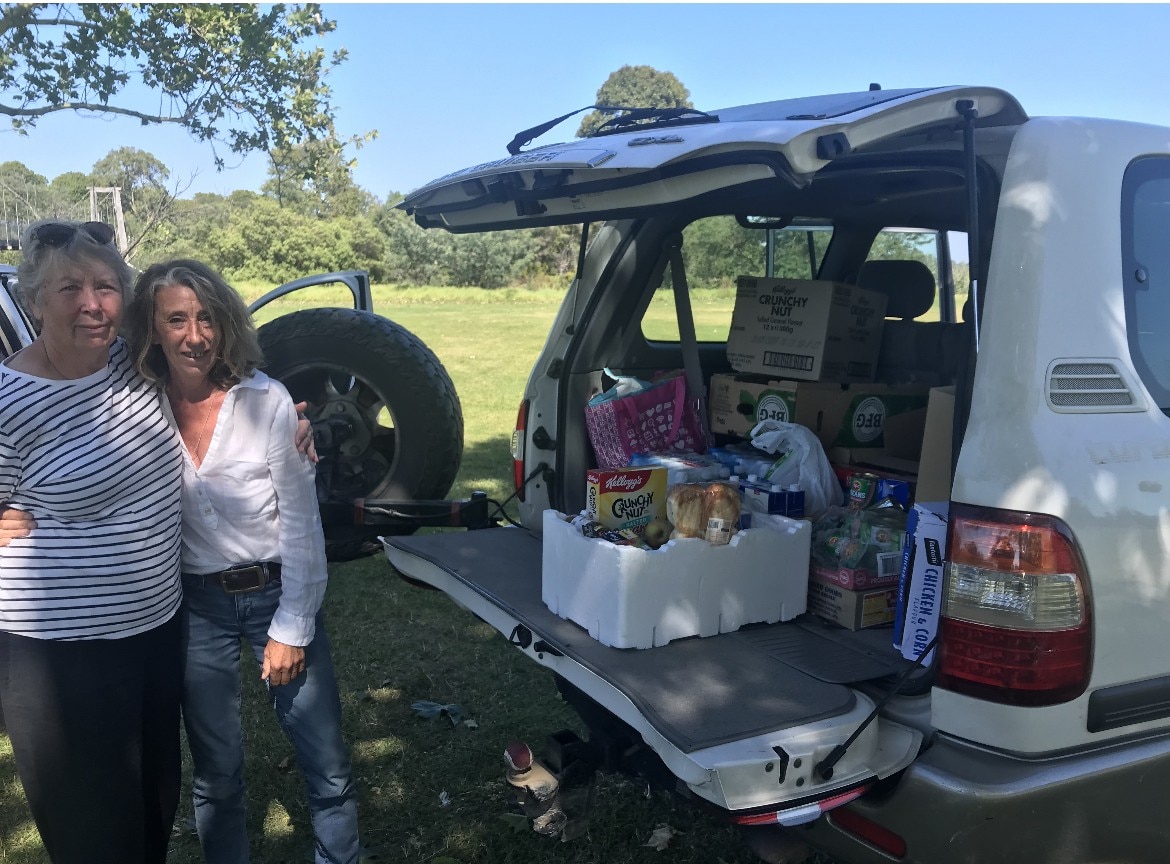 Homeless woman receives food parcel