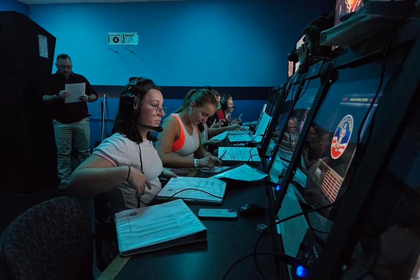 students from loreto college ballarat in control room at nasa space camp
