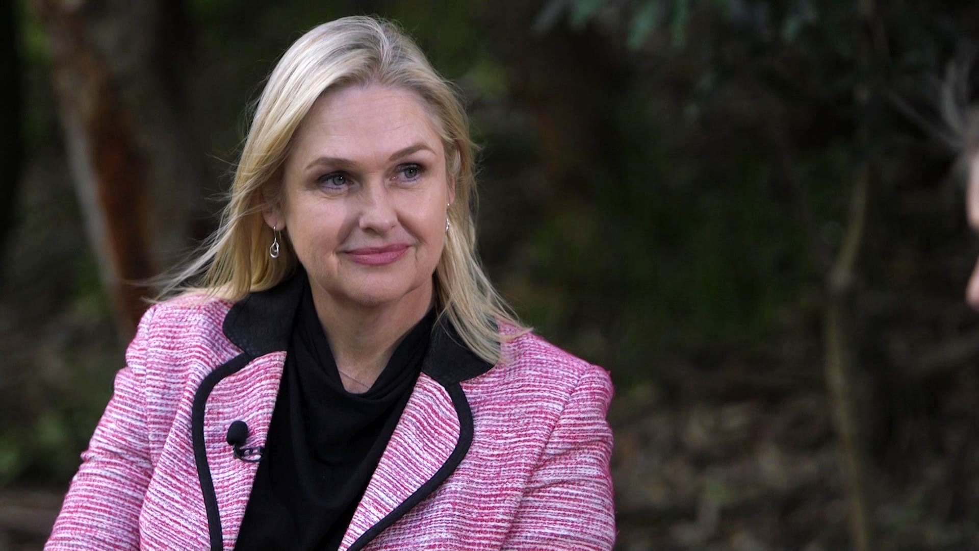 a woman looking and smiling