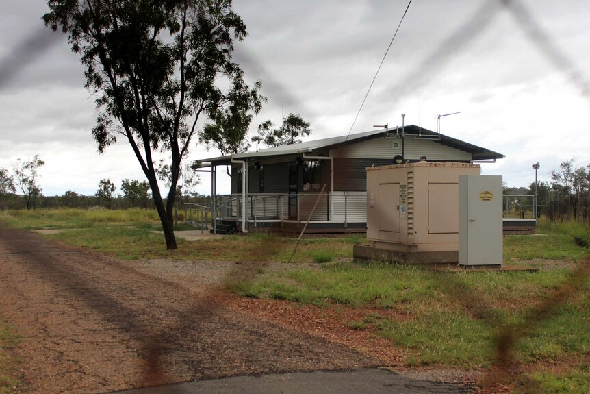 Mount Isa branch for Bureau of Meteorology behind wired fence