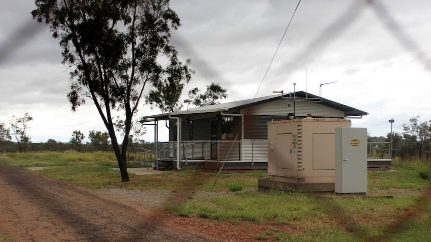 Mount Isa branch for Bureau of Meteorology behind wired fence