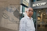 A composite image of Meng Wong standing outside of Suncorp bank, and a bank invoice for 80 thousand dollars.