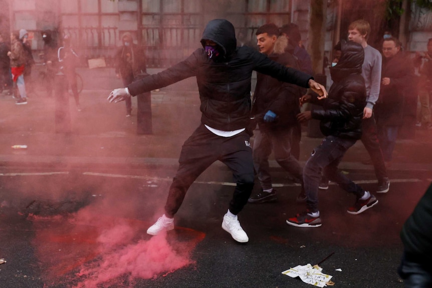 Demonstrators with flares on Whitehall during a Black Lives Matter protest in London