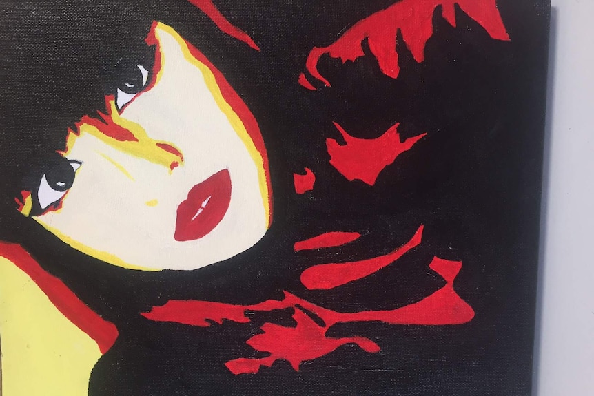 A painting in red, yellow and black of a woman