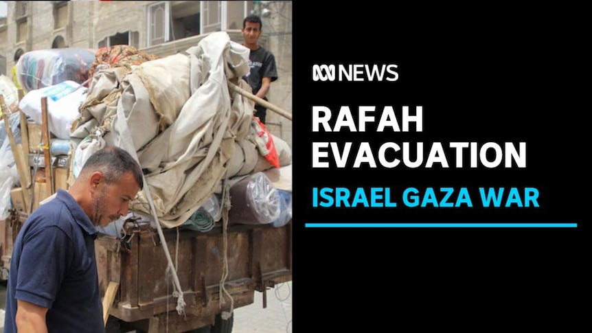 Rafah Evacuation, Israel Gaza War: A man walks in front of a heavily-laden cart. A boy stands on the cart.