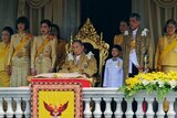 Thai King Bhumibol Adulyadej (C) surrounded by his family