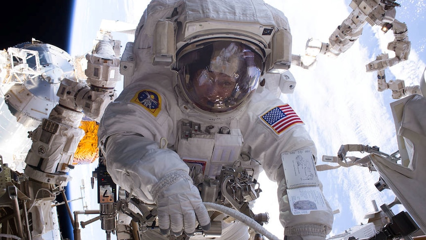 NASA astronaut Peggy Whitson performs a spacewalk aboard the International Space Station.