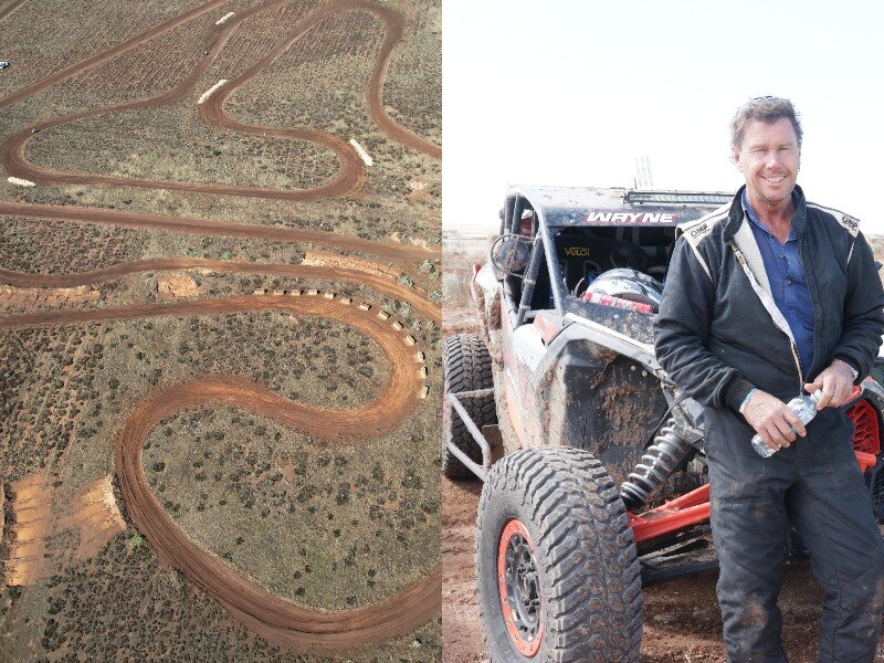 An aerial view of a dirt racetrack on a property and a farmer with an off-road racing vehicle.