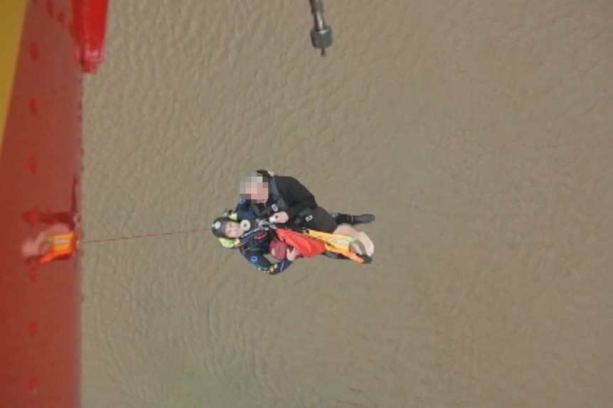 Police image of helicopter rescue from floodwaters, November 13, northern Tasmania.