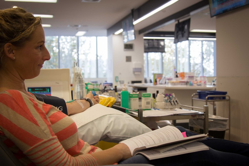 Jeannette Spark donates blood at the Perth Blood Donor Centre.